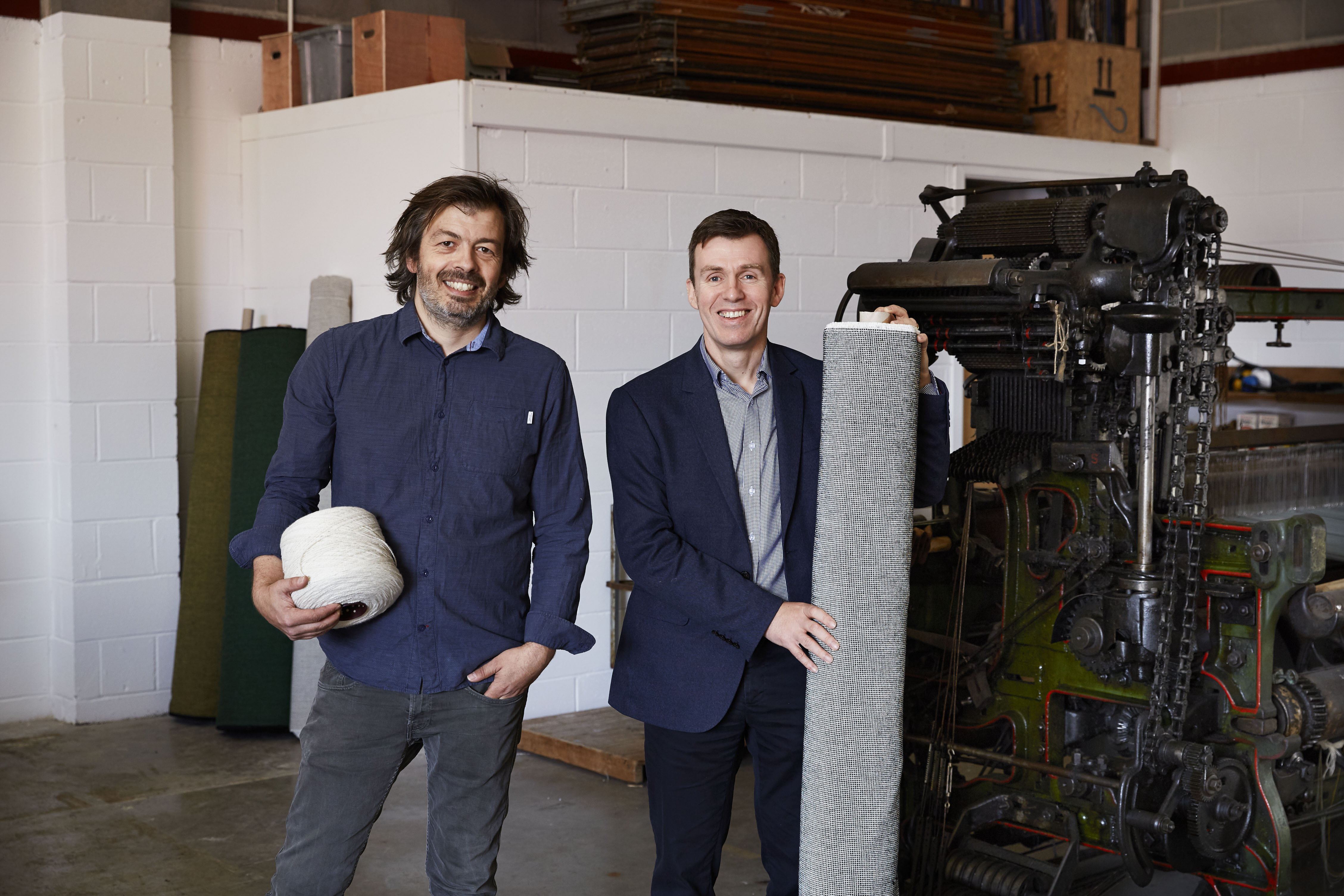 Mario Sierra, Creative Director, Mourne Textiles (left) and David Acheson, Head of Strategic Operations at Ulster Carpets, pictured in the new workshop of Mourne Weavers – a joint venture between the two companies.