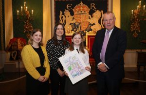 Minister of State Conor Burns & Ulster Carpet designers Sarah Healey & Sinead Tumilty with competition winner Emily McMullan.