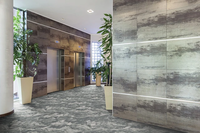 An example of Natura Arcus Lumen from Ulster Carpets in a hospitality setting