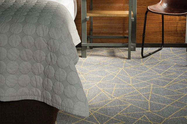 An example of Vescent Linea Citrine from Ulster Carpets in a hospitality setting