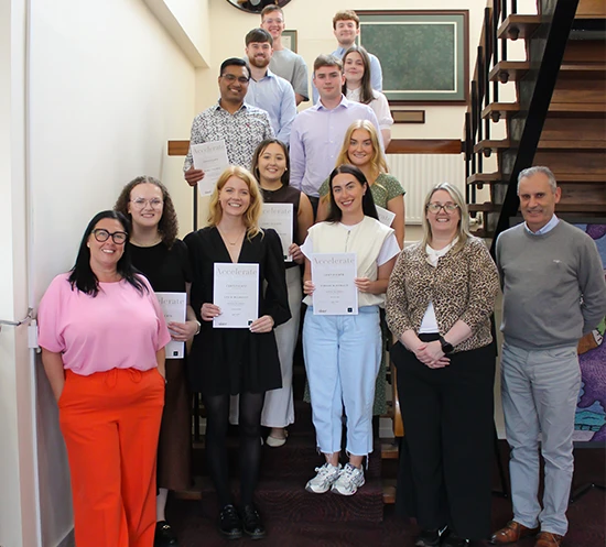 Staff from Ulster Carpets who successfully completed the Accelerate Your Growth development programme.