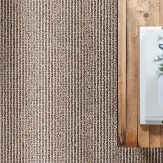 An example of Habitus Strond Fallow from Ulster Carpets in a home setting.