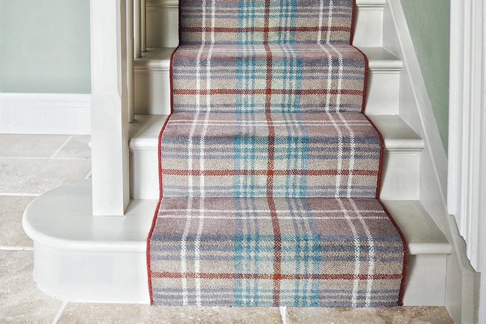 An example of Glenmoy Beige Chisholm from Ulster Carpets on stairs in a home
