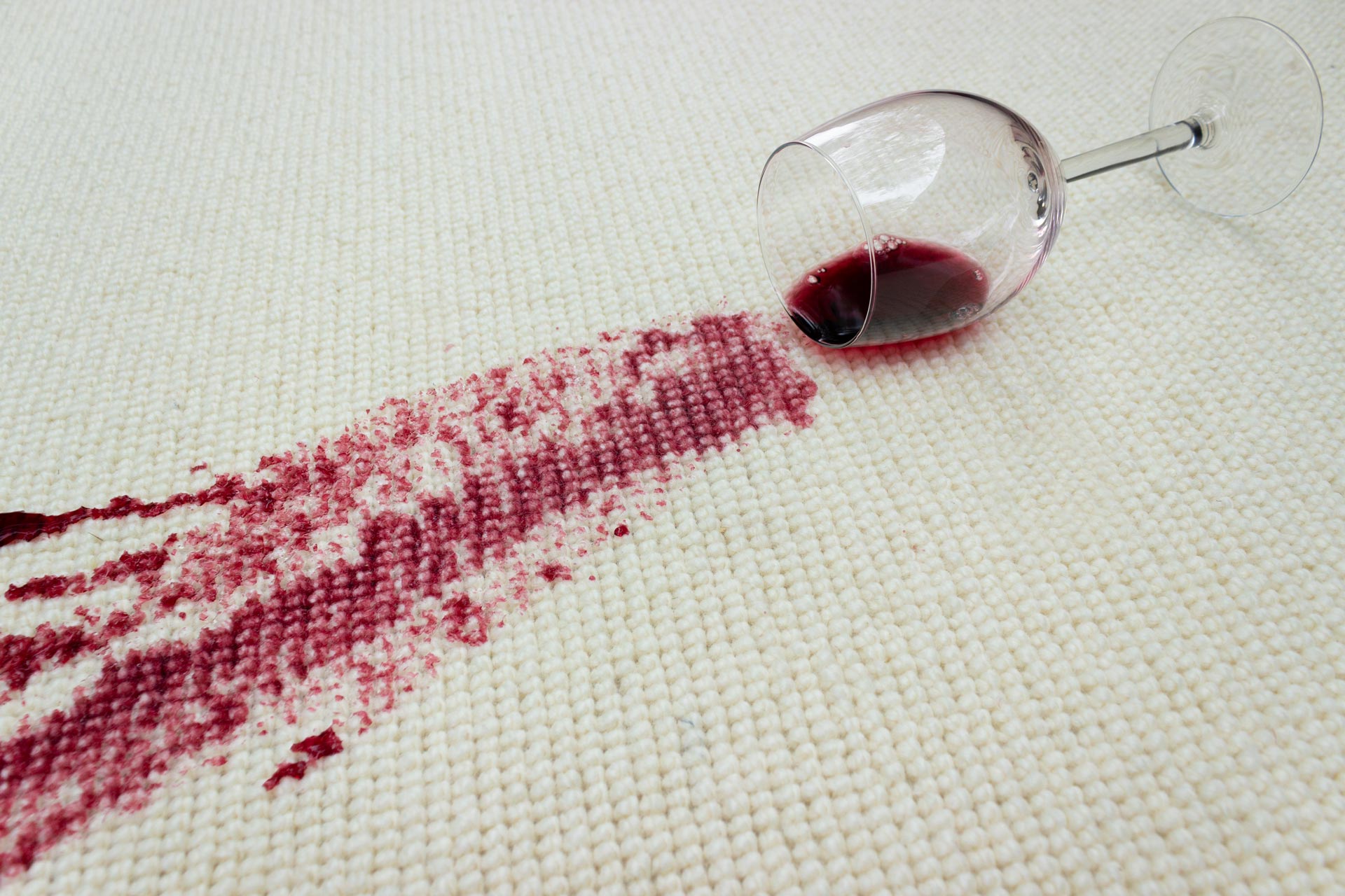 red wine spill on cream wool carpet