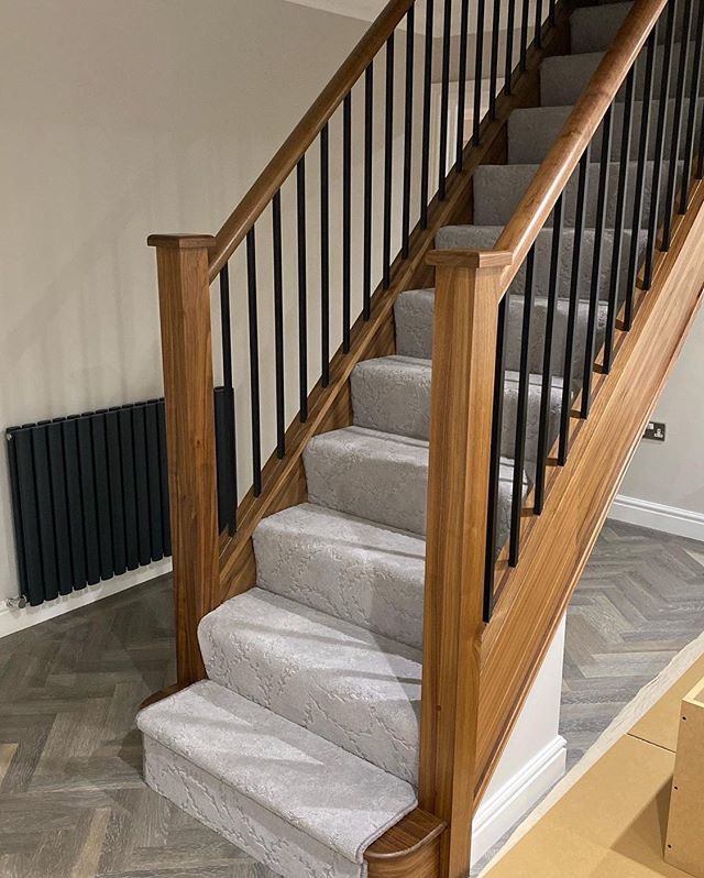 grey stair runner on oak stairs